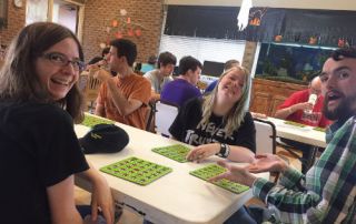 Conor, Abi and Kat enjoying a game of bingo - CLE Austin